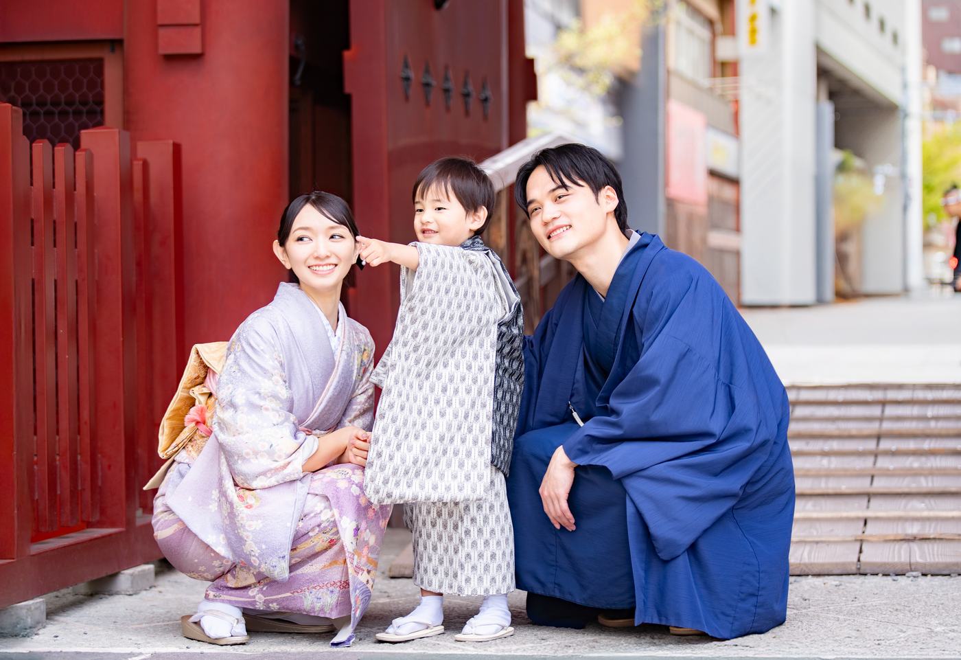 A family heading to a shrine for Shichi-Go-San (a traditional Japanese rite of passage for children).